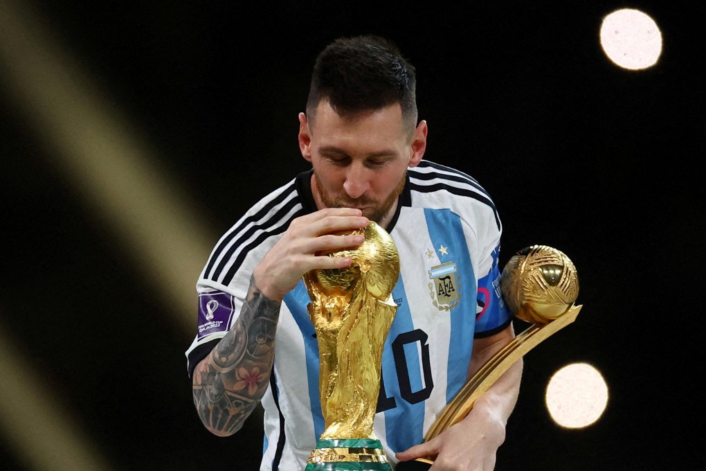 Argentina’s Lionel Messi kisses the World Cup trophy after receiving the Golden Ball award after the 2022 Fifa World Cup final. Photo: Reuters