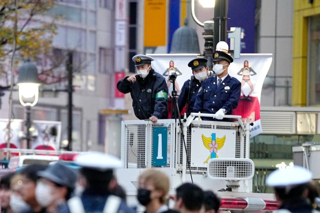 Police officers at work in Tokyo. One of the unofficial Chinese ‘police stations’ is understood to be in the Japanese capital’s Kanda district. Photo: Kyodo