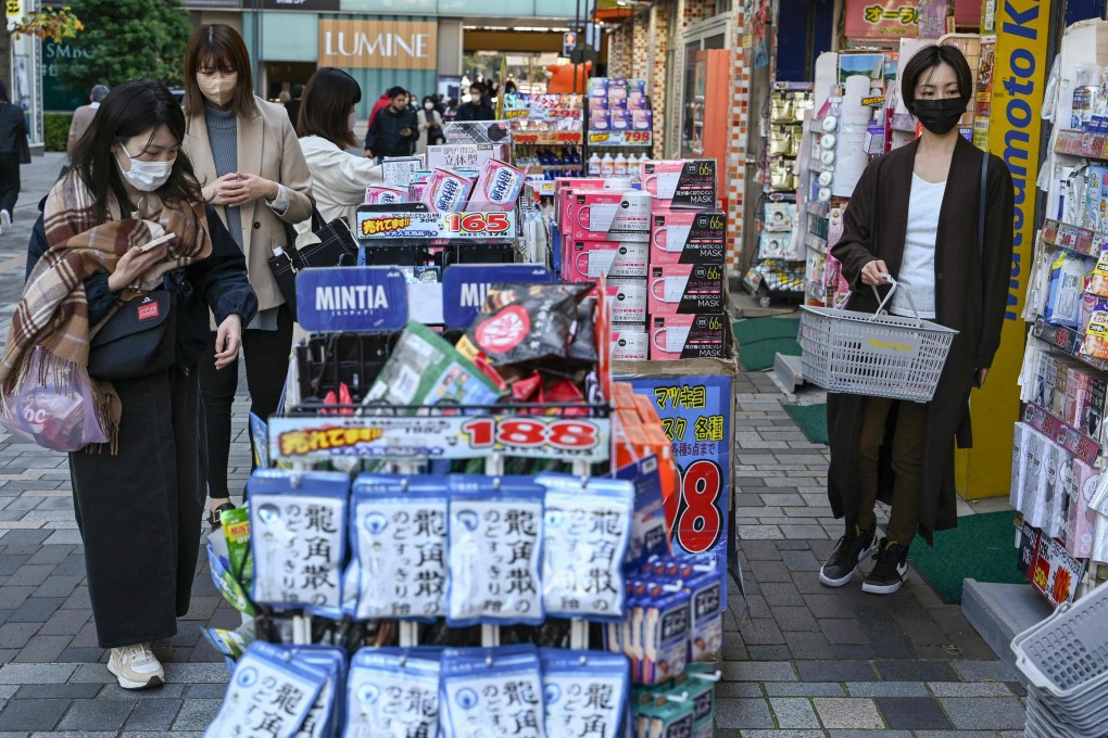 An outdoor display for items outside a drugstore chain store in downtown Tokyo on November 18, 2022. Photo: AFP