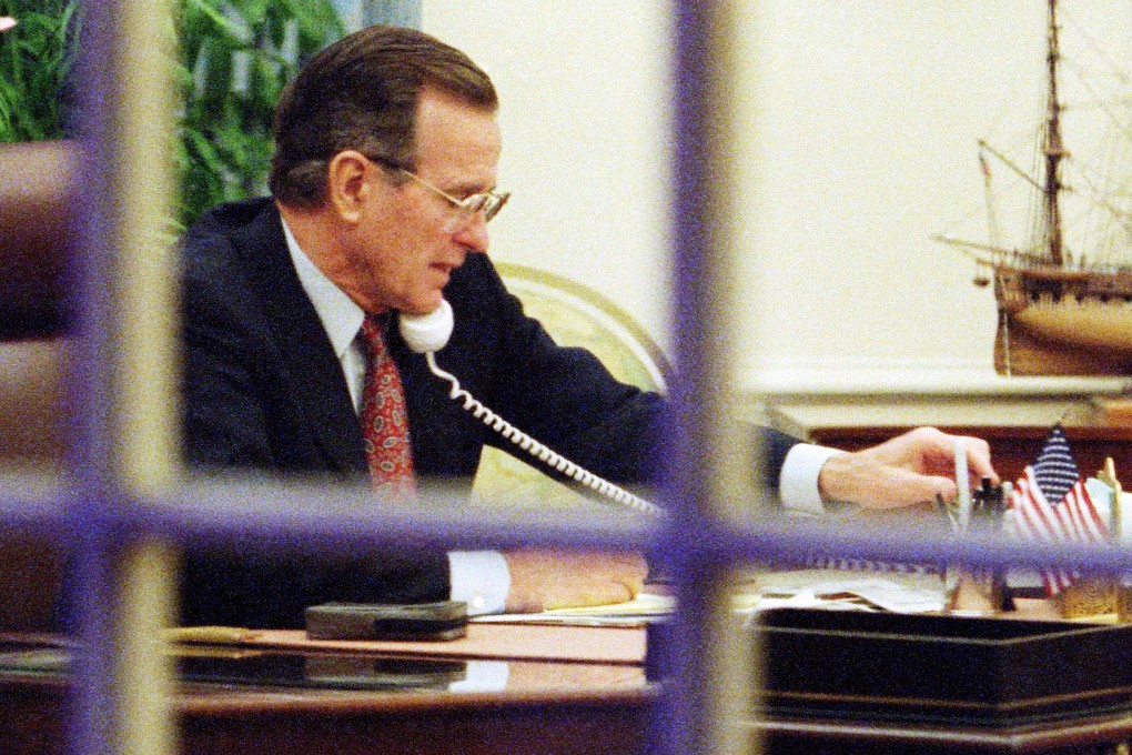 US President George H. W. Bush works in the White House Oval office on January 17, 1991 as Operation Desert Storm continues in an attempt by the United States and its allies to force the Iraqis to leave Kuwait. Photo: AFP