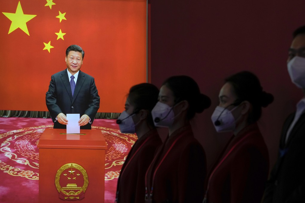 Stewards wait to guide at an exhibition highlighting China’s achievements under President Xi Jinping’s leadership at the Beijing Exhibition Hall on October 12, in the run-up to the 20th party congress. Photo: AP