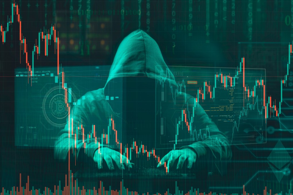 hooded hacker stealing or scamming crypto currency Shutterstock ID: 2175912727 Photo: Shutterstock