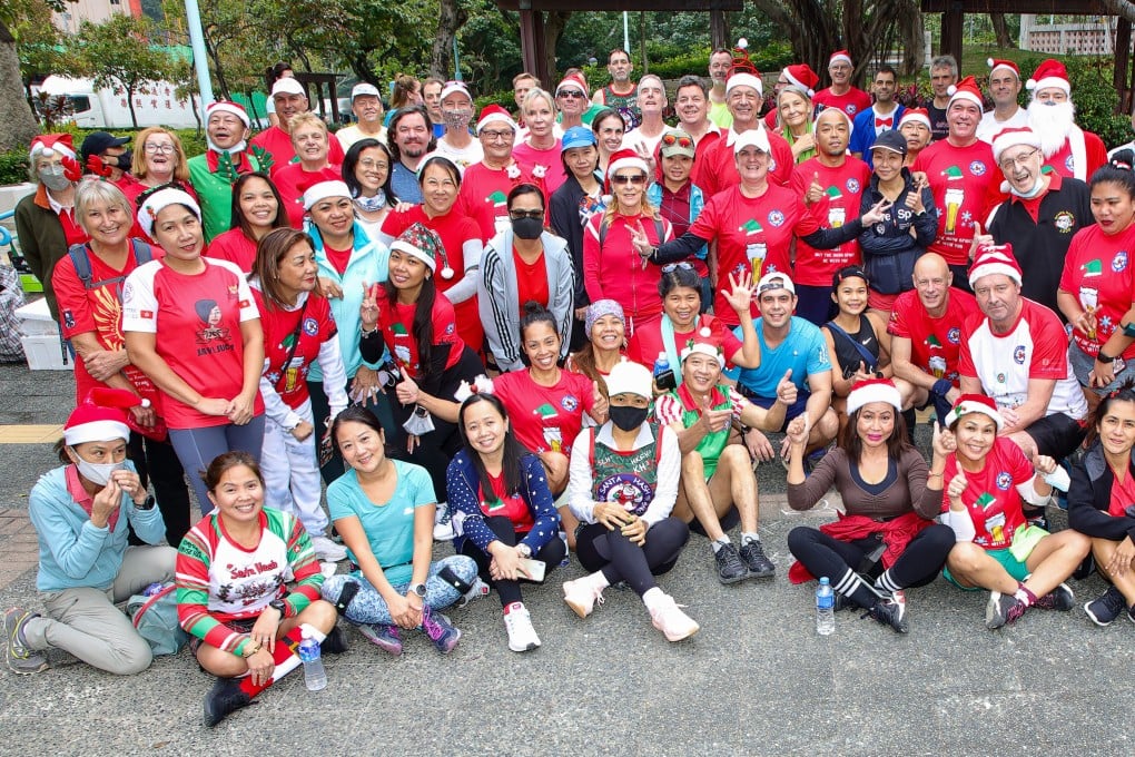 Hong Kong’s Hash House Harriers dress up as Kriss Kringle and run to raise money for charity. Photo: Bharat Khemlani