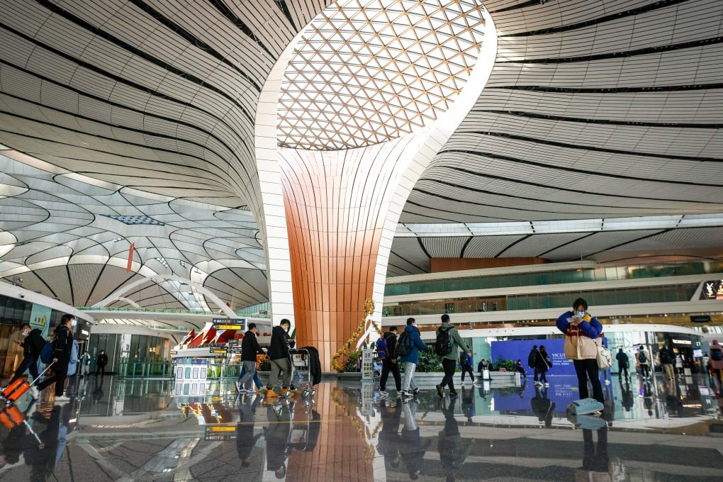 Passengers at Beijing’s Daxing Airport ahead of the lifting of restrictions next month. Photo: EPA-EFE