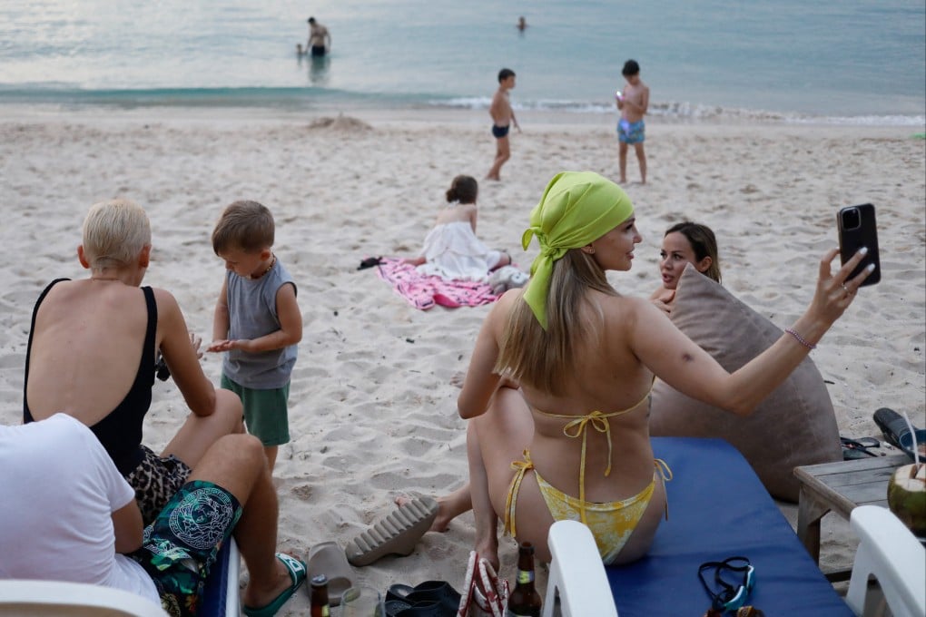 Russian tourists enjoying Layan beach in Phuket. Photo: Reuters
