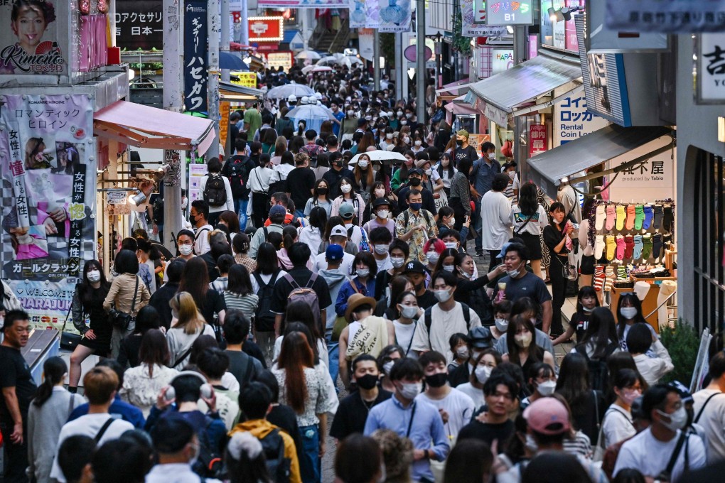 People walk down Takeshita Street in the popular Harajuku area of Tokyo. Japan has reintroduced negative Covid-19 tests for Chinese travellers as mandatory conditions of entry. Photo: AFP