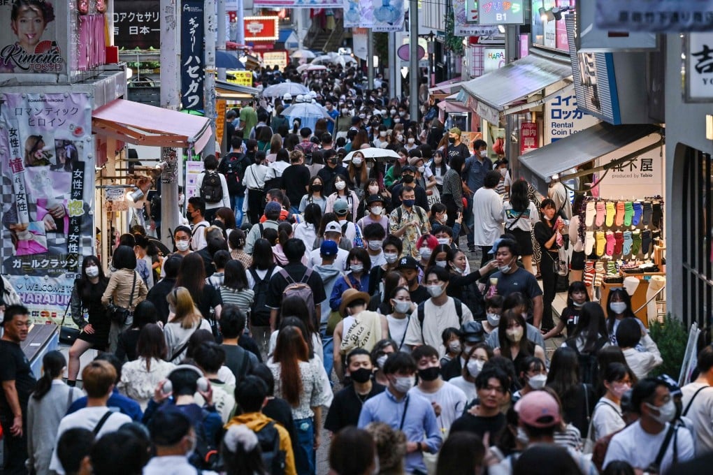 People walk down Takeshita Street in the popular Harajuku area of Tokyo. Japan has reintroduced negative Covid-19 tests for Chinese travellers as mandatory conditions of entry. Photo: AFP