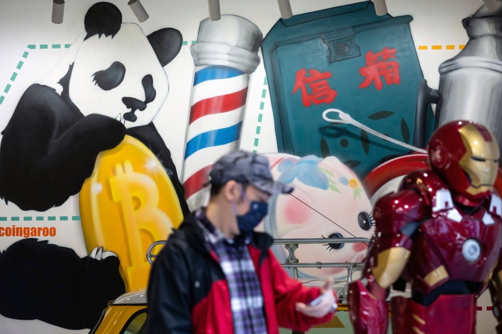 A mural featuring the Bitcoin logo in Hong Kong. Photo: Bloomberg
