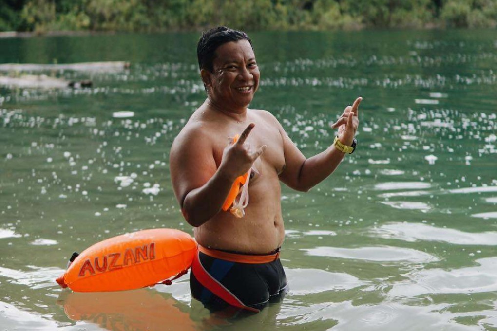 Auzani Ridzwan in training for an open-water swim meet. The Malaysian suffered two heart attacks training for a half Ironman, leading to a diet and exercise overhaul that has him feeling better than ever. Photo: Facebook / Auzani Ridzwan
