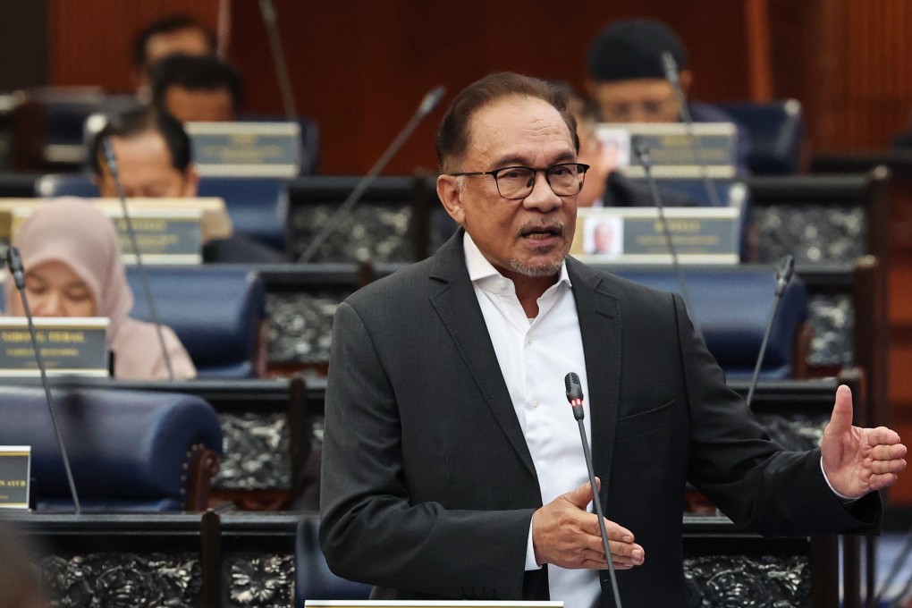 Malaysian Prime Minister Anwar Ibrahim speaks during a plenary session of parliament on December 20. Photo: DPA