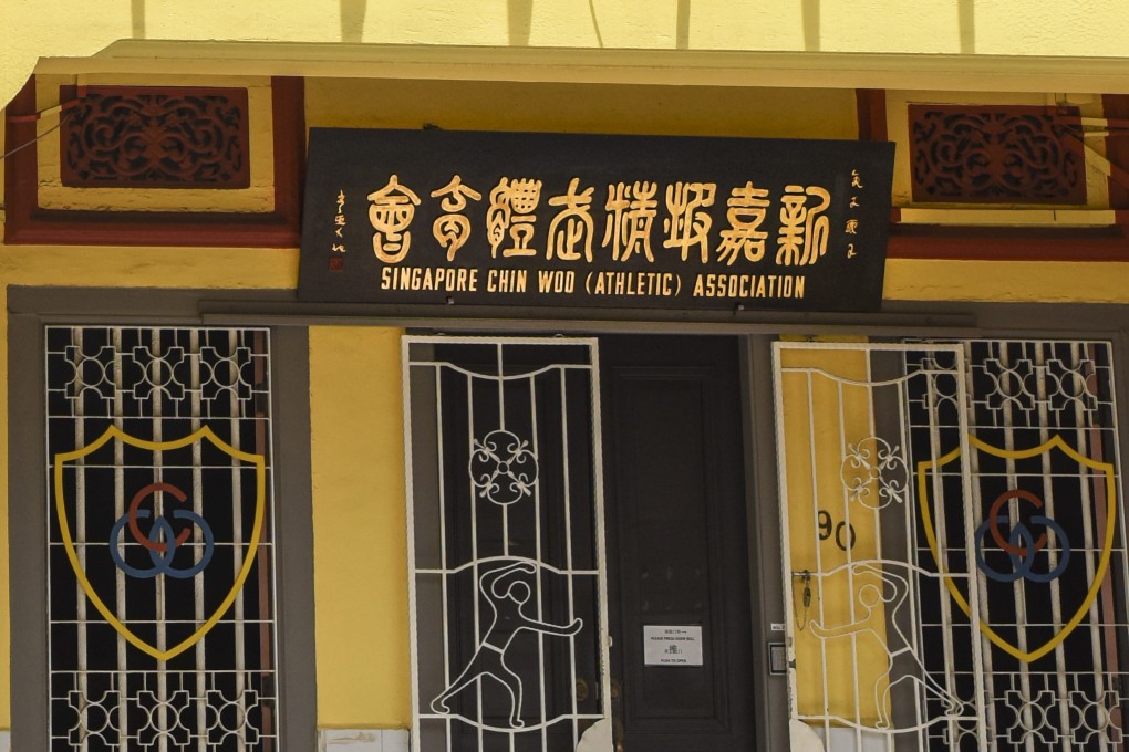 Traditional signboards are common in Singapore’s Chinatown. The dying art of Chinese signboard making is being kept alive in the city state by two men. Photo: Ronan O’Connell