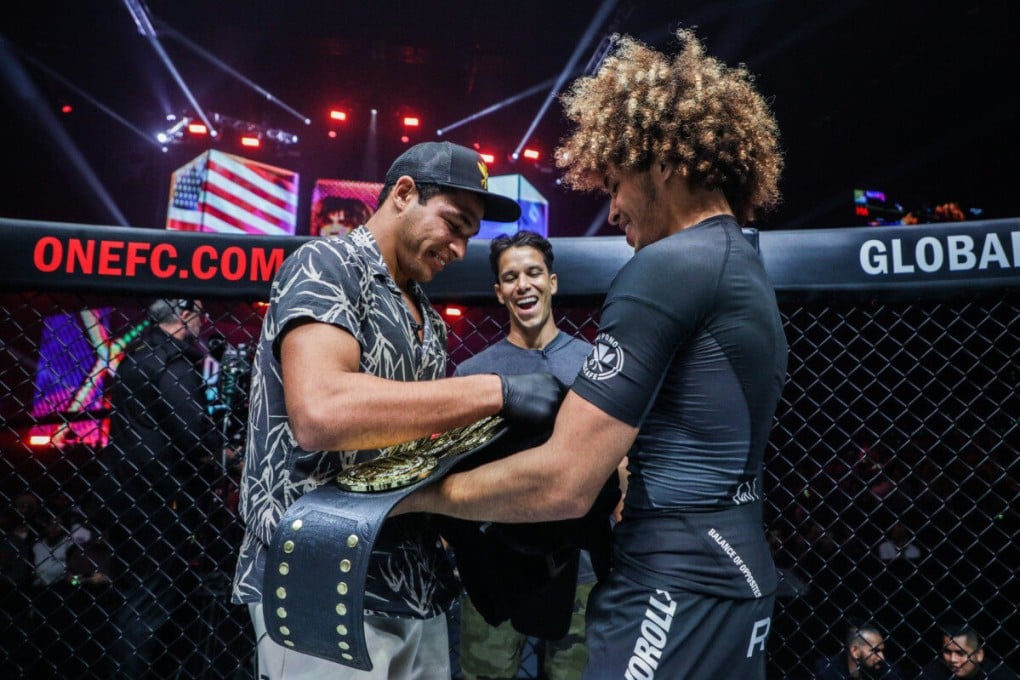 Kade Ruotolo (right) celebrates his lightweight submission grappling title win with his brother Tye. Photos: ONE Championship.