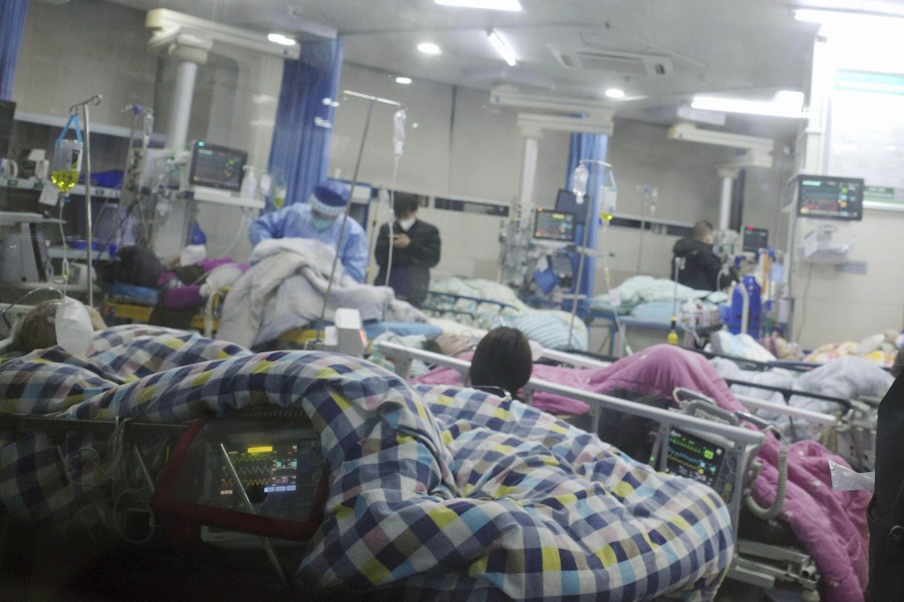 Elderly patients lie on emergency department beds at a hospital in Wuhan on December 28, 2022, amid a surge in Covid-19 cases. Photo: Kyodo