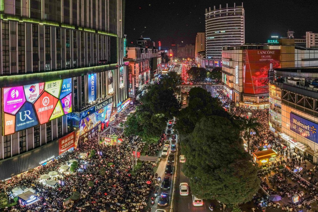 New Year’s Eve crowds in Nanning, in China’s southern Guangxi region. Photo: AFP