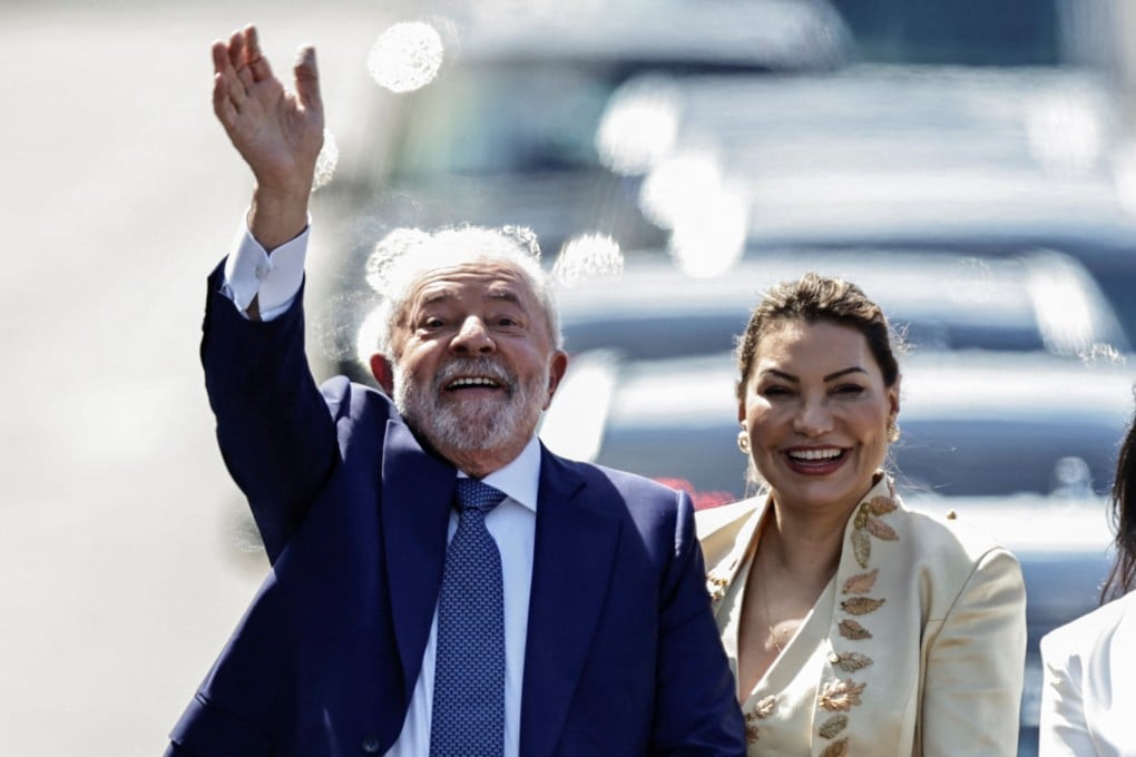 Brazil’s President elect Luiz Inacio Lula da Silva waves to supporters on the day of his swearing-in ceremony in Brasilia on Sunday. Photo: Reuters