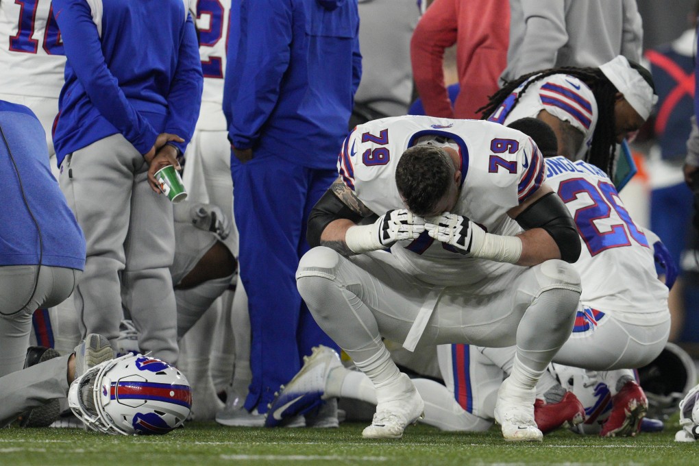 Buffalo Bills’ Spencer Brown (79) reacts as teammate Damar Hamlin is examined during the first half of an NFL game against the Cincinnati Bengals. Photo: AP