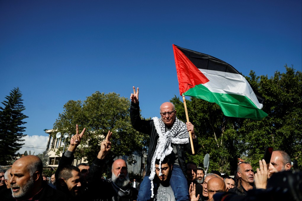 A heroes welcome in his home village for the longest serving Palestinian prisoner, Karim Younis. Photo: Reuters