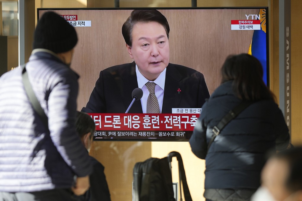South Korean President Yoon Suk-yeol is shown on a TV screen in Seoul. Photo: AP/File