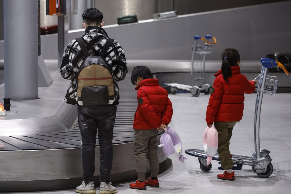 People travelling from China wait for their baggage at an airport in France. Australia’s health minister pointed out that several European states, as well as the US and Japan, also require travellers from China to provide a negative pre-departure Covid test. Photo: EPA-EFE