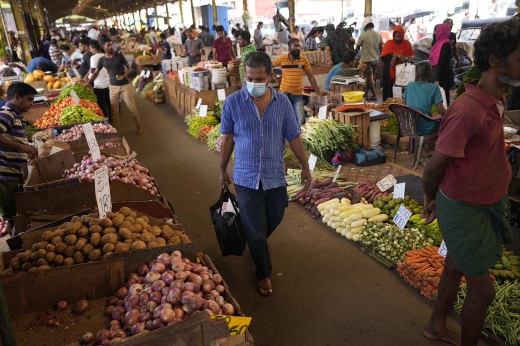 China’s reopening is expected to deepen inflation woes, with a surge in demand driving up prices across one of the world’s poorest regions, which includes smaller economies such as Nepal and Sri Lanka. Photo: AP