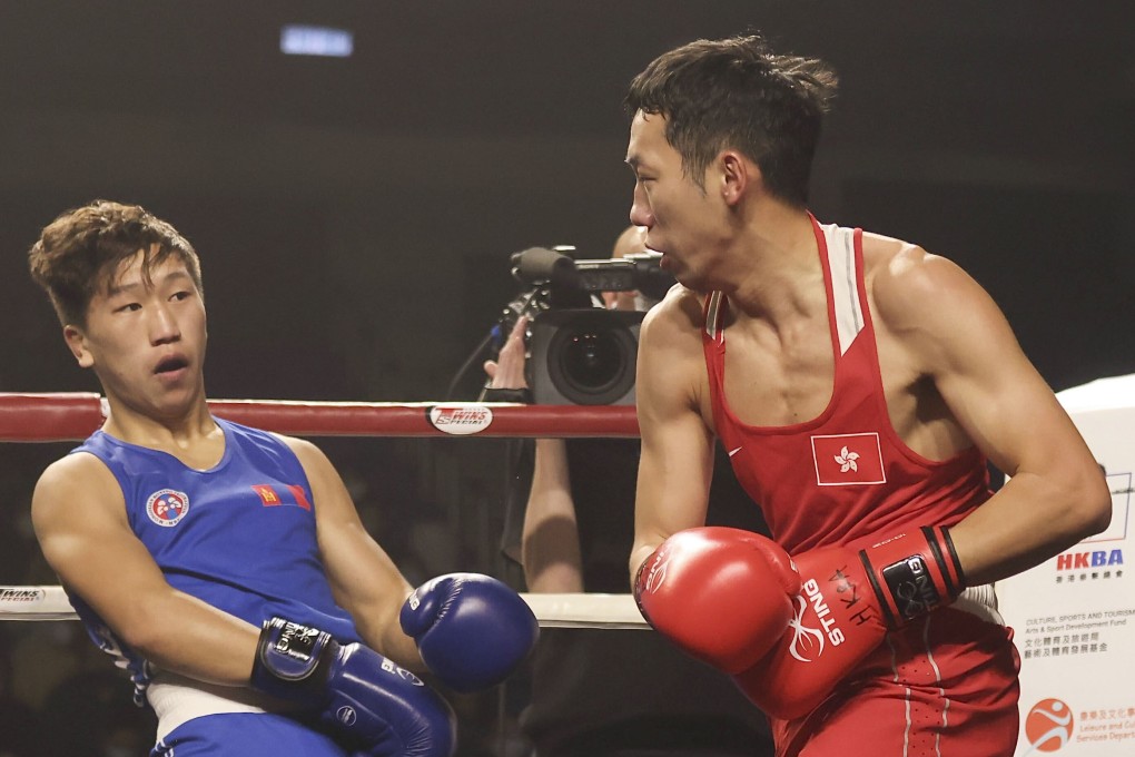 Hong Kong’s Rex Tso throws a punch at Mongolia’s Kharkuu Bilguunsaikhan at the Ultimate Extreme Fight Hong Kong 2023 event, at Southorn Stadium in Wan Chai. Photo: Jonathan Wong