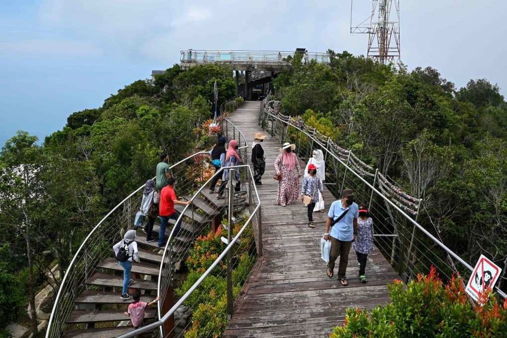 Visitors walk up to the lookout point near the Langkawi Skycab cable car. Photo: AFP