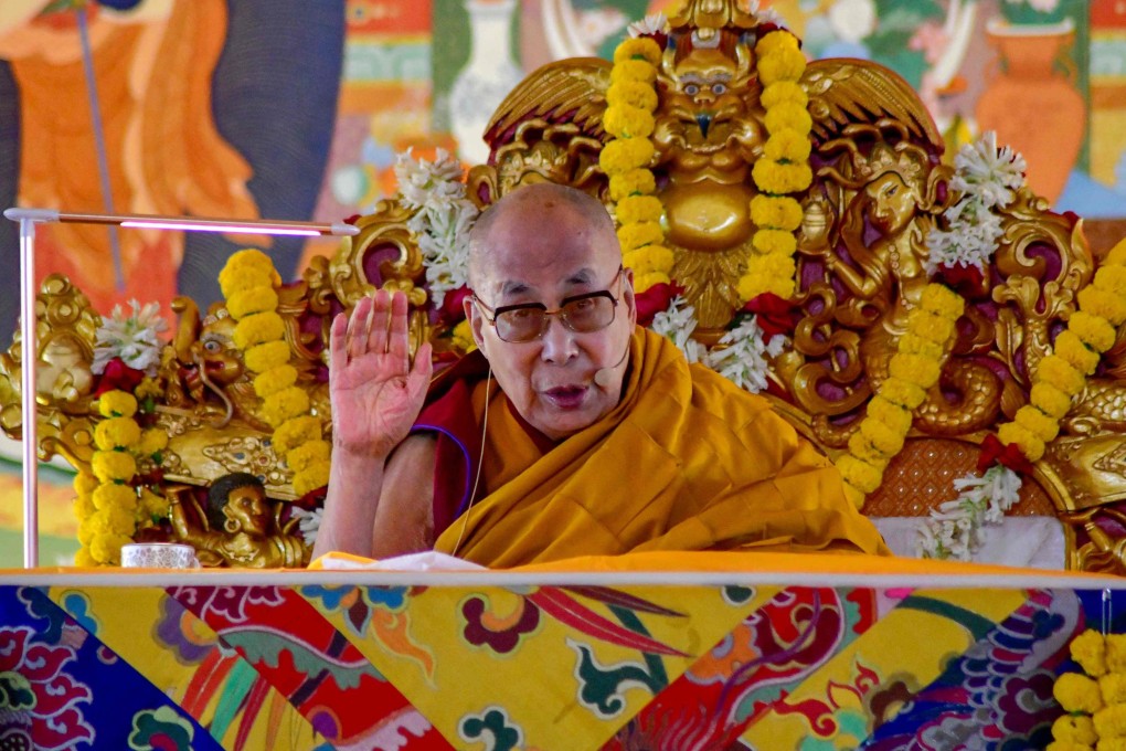 Tibetan spiritual leader Dalai Lama gestures during his first day of a teaching session in Bodhgaya, India on December 29. Photo: AFP