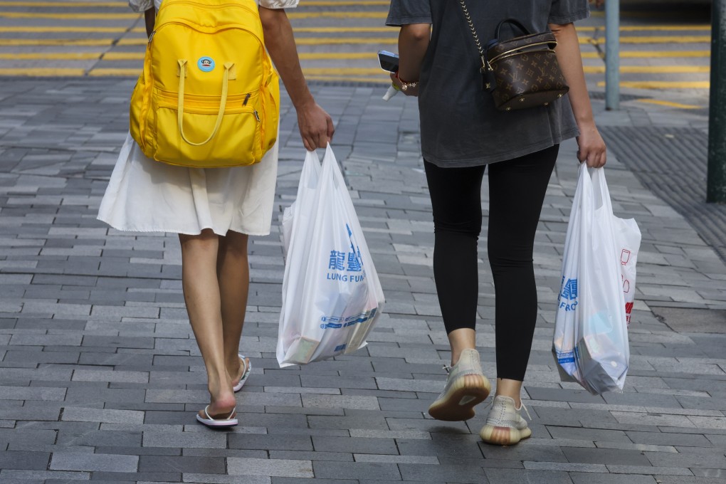 People with plastic bags in Tsim Sha Tsui on July 27. Photo: Edmond So