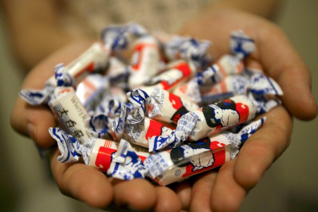 White Rabbit Creamy Candy is a mainstay of the Lunar New Year treat box. As it marks 80 years, new flavours are being launched. That follows the debut of White Rabbit Ice Cream and of White Rabbit-themed Coach accessories. Photo: EPA