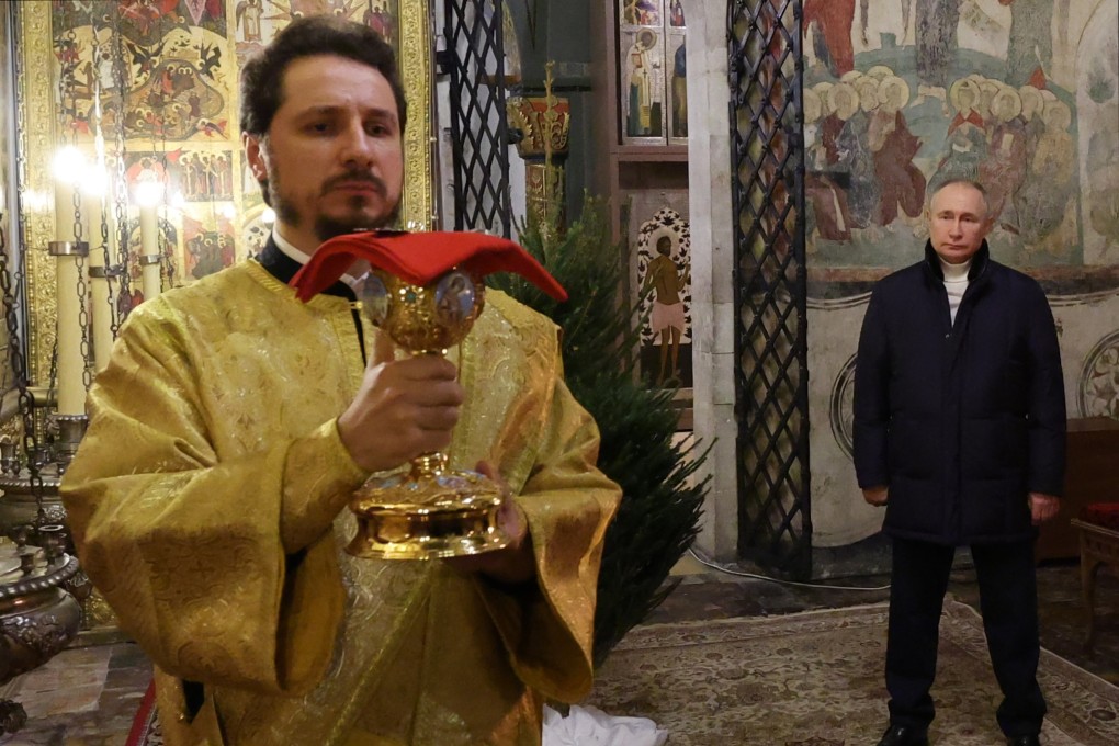 Vladimir Putin appears alone at Orthodox Christmas Eve service in ...