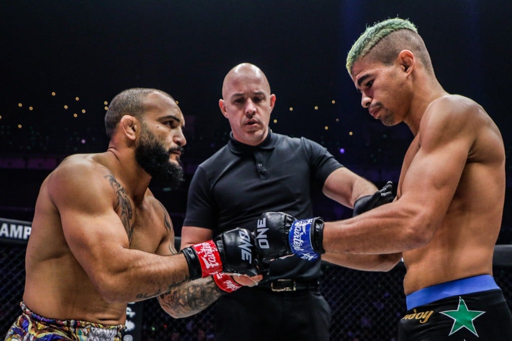 John Lineker (left) and Fabricio Andrade touch gloves before their bantamweight title fight, which ended in a no contest due to an inadvertent low blow. Photos: ONE Championship.