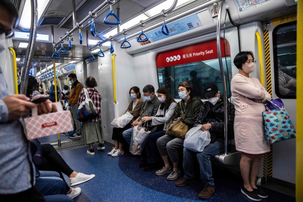 Passengers on an MTR train in Hong Kong. Photo: AFP