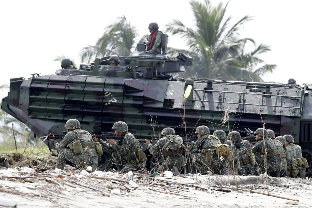 Philippine marines during a military exercise. There has been a series of top-level changes among their bosses in recent months. File photo: AP