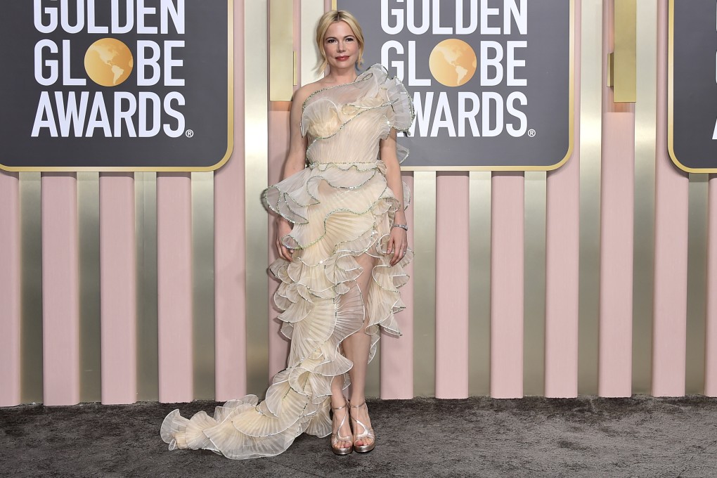 Michelle Williams, star of Steven Spielberg’s The Fabelmans, arrives for the Golden Globe Awards ceremony at The Beverly Hilton hotel on Tuesday. Photo: Jordan Strauss/Invision/AP