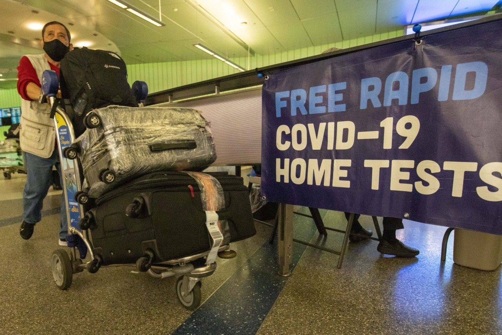 A traveller at Tom Bradley International Terminal at Los Angeles International Airport on January 9. The United States requires travellers from China, including Hong Kong and Macau, to take a Covid-19 test no more than two days before travel. Photo: Bloomberg