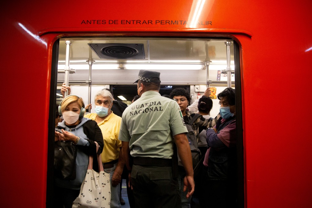 A member of the National Guard patrols a metro train in Mexico City, Mexico. Photo: Reuters
