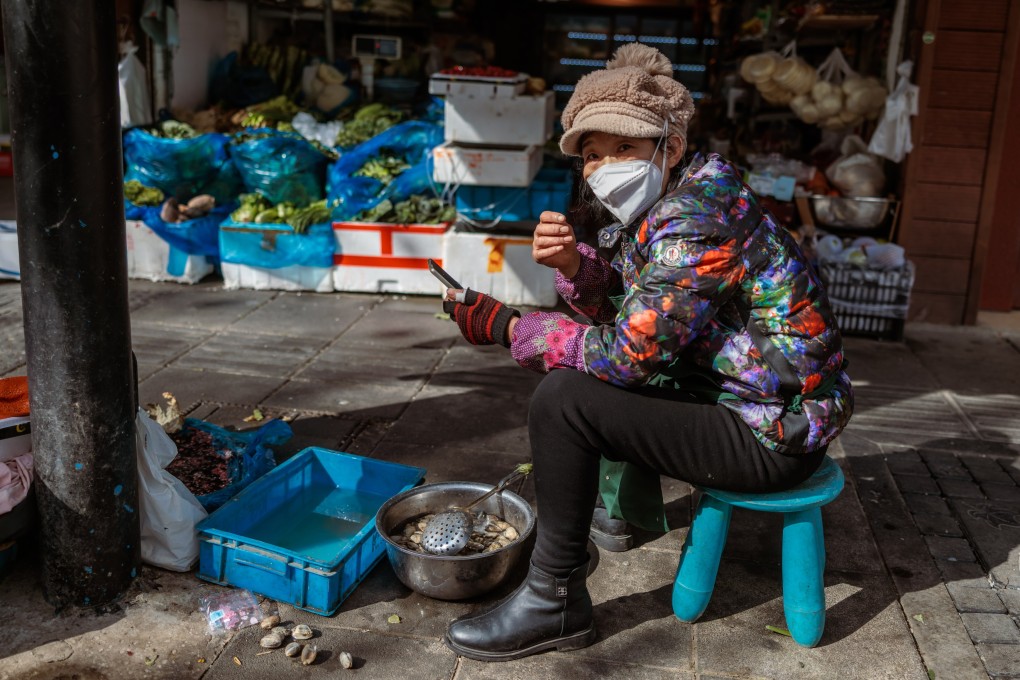 China’s full-year growth figure, if confirmed officially on Tuesday, will only be slightly better than the 2.3 per cent growth seen in 2020 which was the lowest since 1976. Photo: EPA-EFE