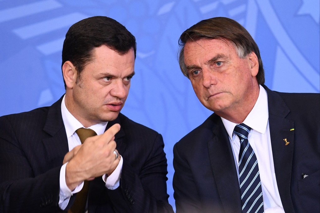 Former Brazilian president Jair Bolsonaro (right) and his Minister of Justice Anderson Torres. Torres was arrested when he arrived in the capital Brasilia from the US, where both he and his former boss were at the time of the riot. Photo: AFP
