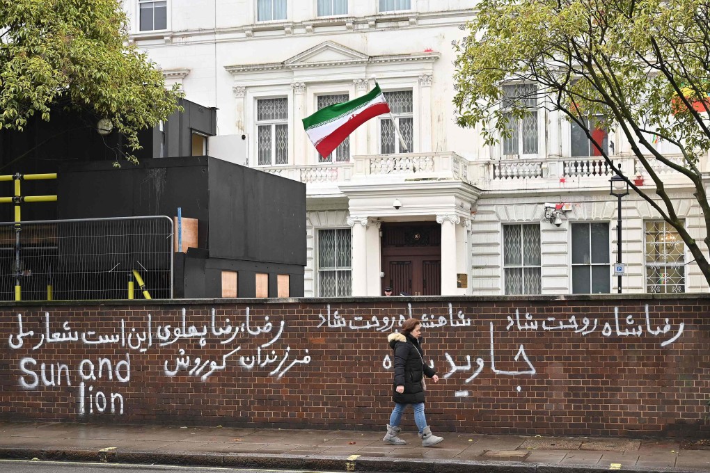 Graffiti daubed on a wall outside the Iranian Embassy in London. Photo: AFP