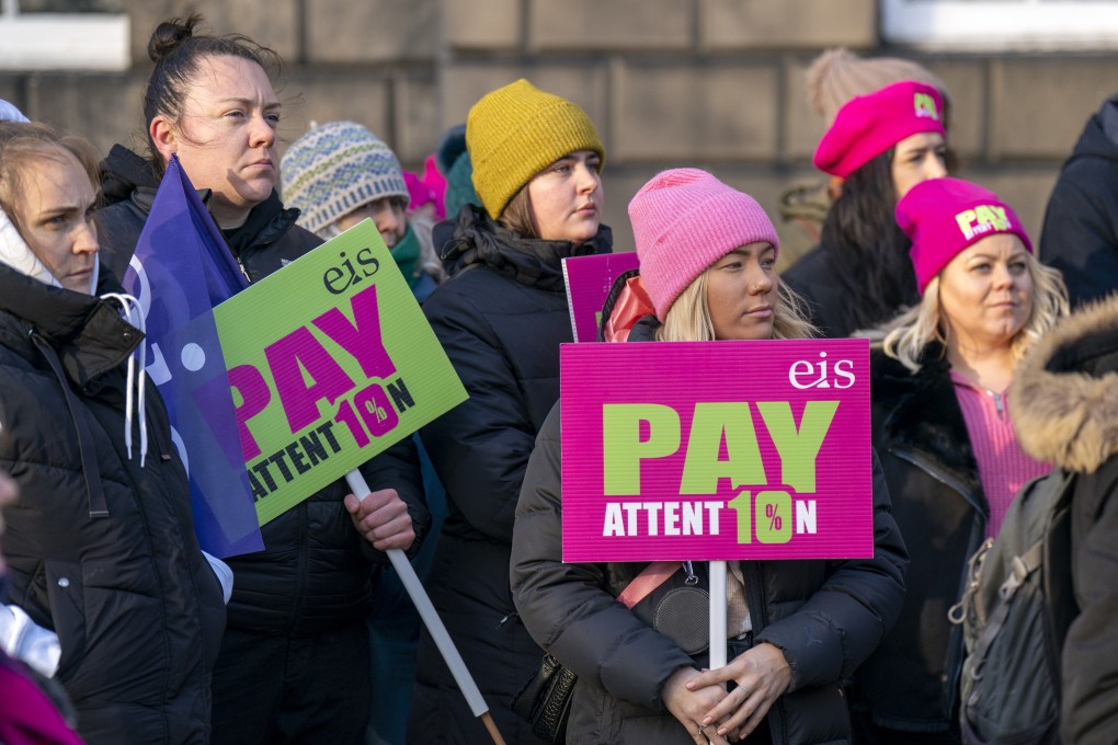 Members of the EIS demonstrate stand outside Bute House in Edinburgh as teachers from secondary schools around Scotland are shut as members of the EIS and SSTA unions take strike action in a dispute over pay. Photo: dpa