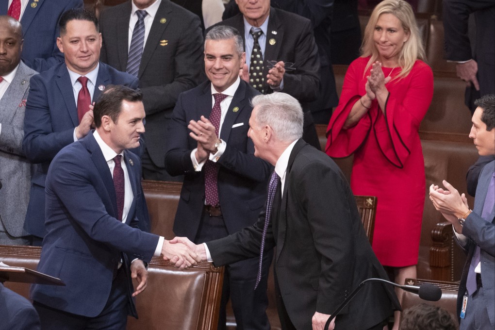 House Republican Leader Kevin McCarthy (right) shakes hands with Republican Representative of Wisconsin Mike Gallagher after Gallagher nominated him to be the next speaker of the House on Capitol Hill in Washington on January 4. Gallagher is the head of a new select committee on US competition with China. Photo: EPA-EFE