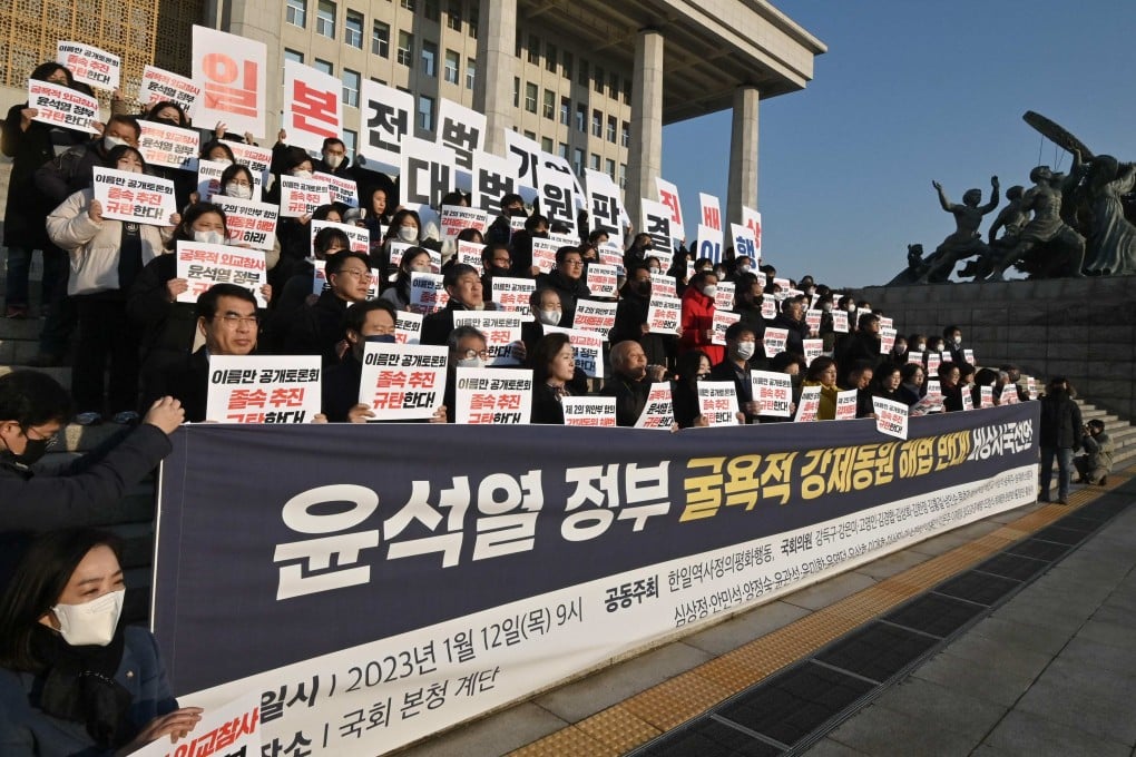 South Korean opposition lawmakers and supporters of the victims of Japan’s wartime forced labour protest Yoon Suk-yeol government’s solution to the forced labour issue. Photo: AFP
