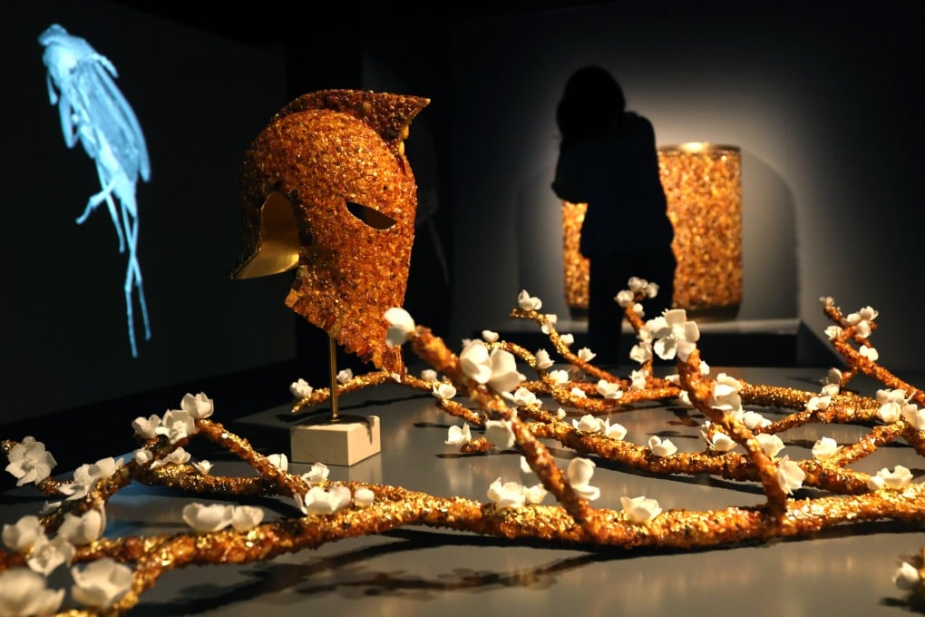 Contemporary amber artworks “Amber Helmet” and “Flowering Branches” by Aline Putot-Toupry and Bruno Toupry on show in the exhibition Amber: Baltic Gold at City University of Hong Kong. Photo: Edmond So