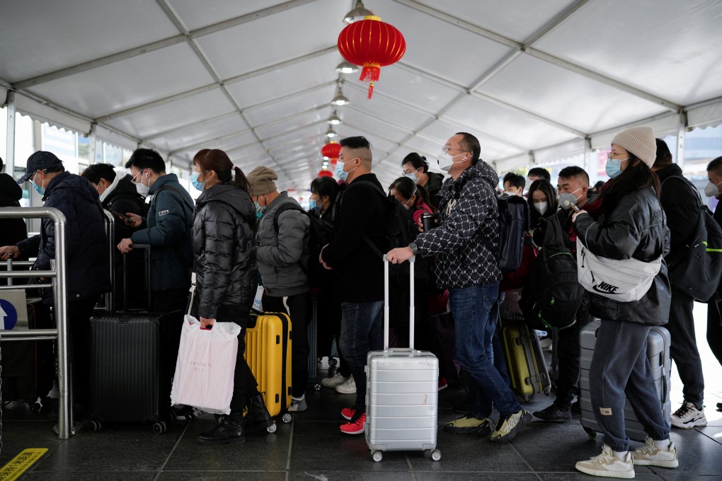 Travellers at a railway station in Shanghai. Foreign investors are yet to buy into China’s reopening story because of concerns about the impact of rapidly growing infection numbers on companies’ growth and earnings. Photo: Reuters