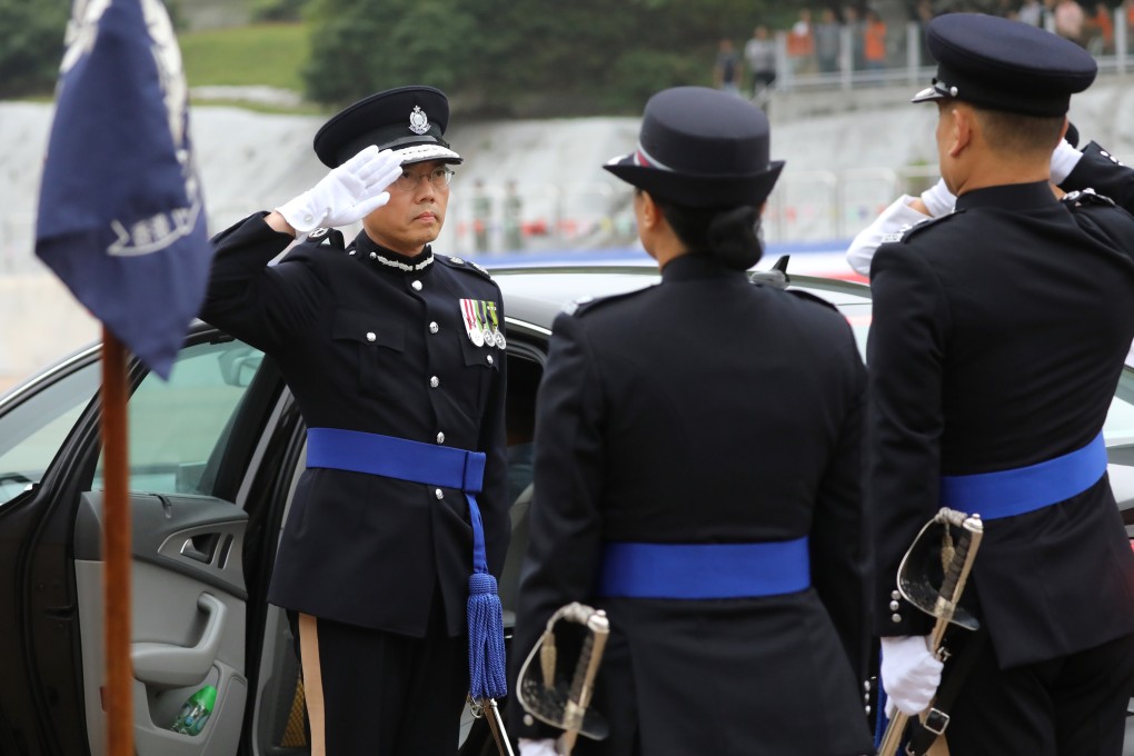 Then-Deputy Commissioner of Police Operations Alan Lau Yip-shing (left) is seen saluting in the Hong Kong Police College passing out parade in Wong Chuk Hang in November 2018. He is among the new faces from Hong Kong selected to join the Chinese People’s Political Consultative Conference. Photo: Edward Wong