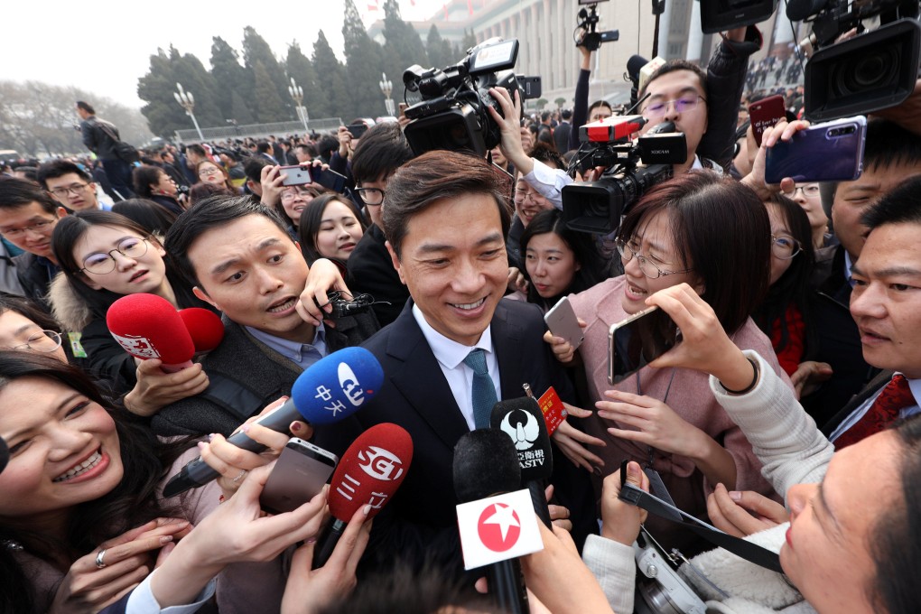 Baidu CEO Robin Li speaks to the media as he arrives for the opening session of the CPPCC at the Great Hall of the People in Beijing in March 2019. Photo: Reuters