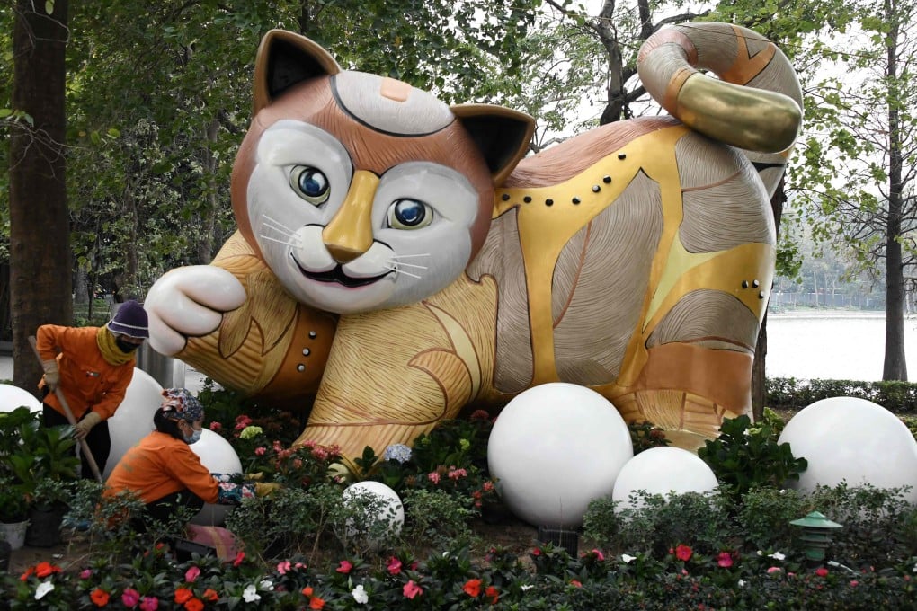 As China gears up to welcome the Year of the Rabbit, the Lunar New Year looks slightly different in Vietnam -- where the Year of the Cat is about to begin. Photo: AFP