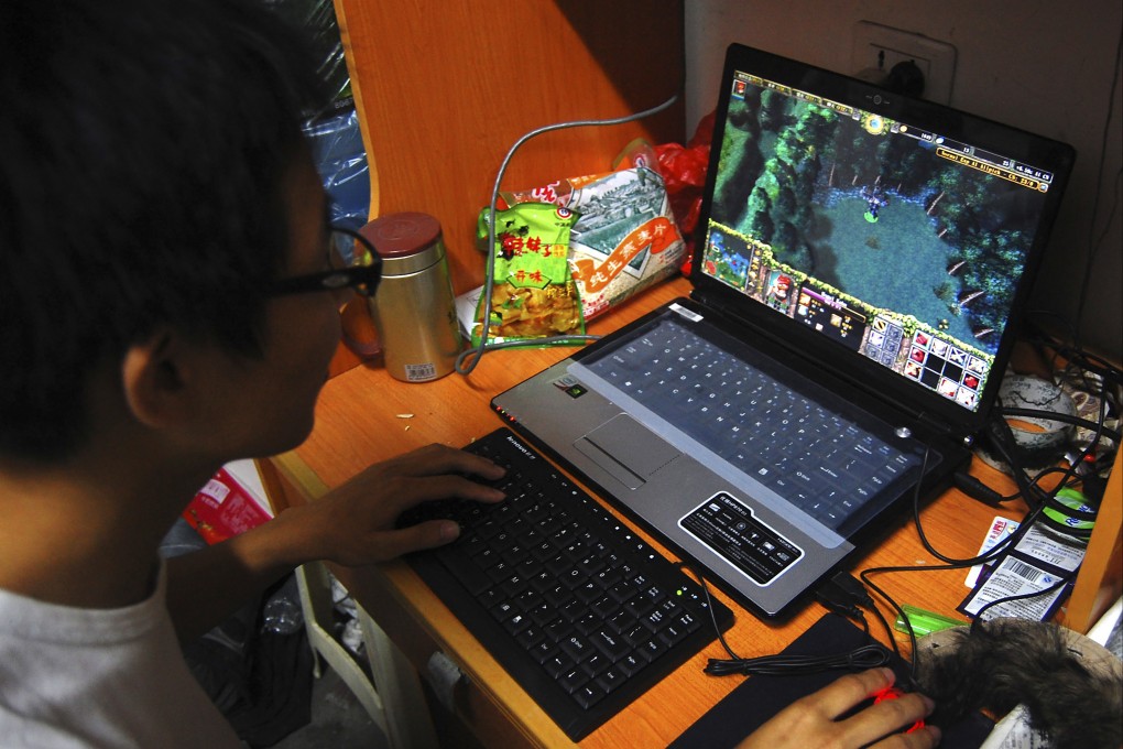 In this file photo in 2009, a college student plays World of Warcraft in his dormitory room in southwest China’s Chongqing city. Photo: Chinatopix via AP