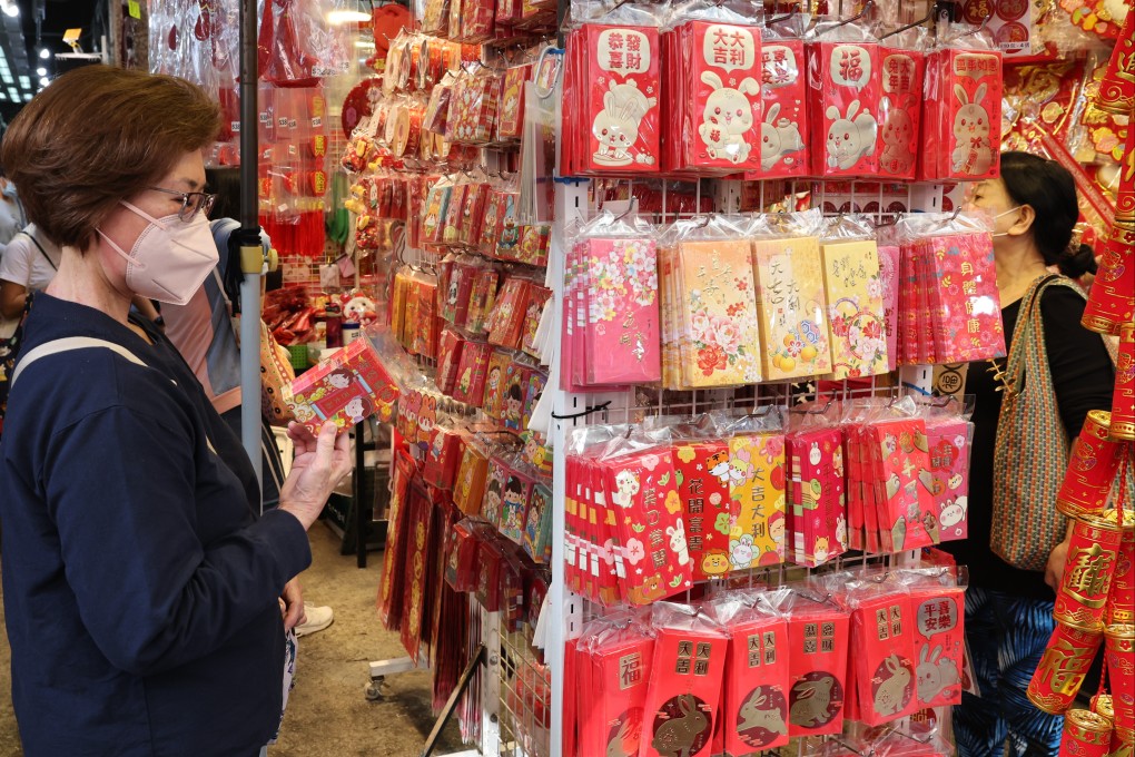 People shop at a market offering Lunar New Year decorations and red packets in Hong Kong’s Mong Kok area on January 14, 2023. Photo: Edmond So