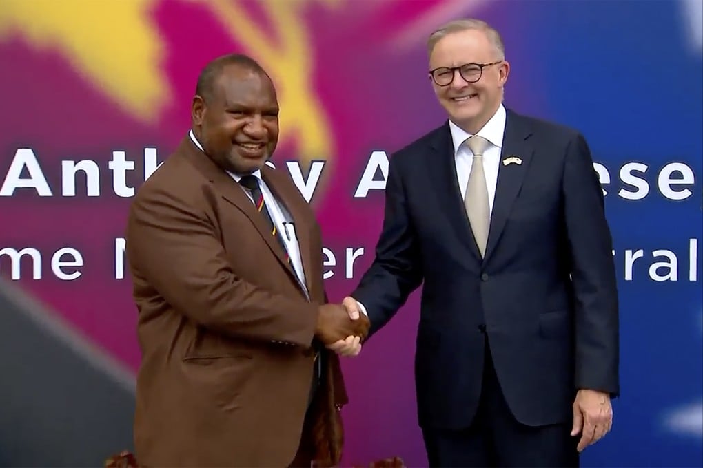Australian Prime Minister Anthony Albanese (right) shakes hands with Papua New Guinea’s Prime Minister James Marape outside the parliament in Port Moresby earlier this month. Photo: Australia Pool via AP